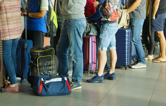Long lines for air travel and service creates woes and reasons for Americans not to increase their travel.